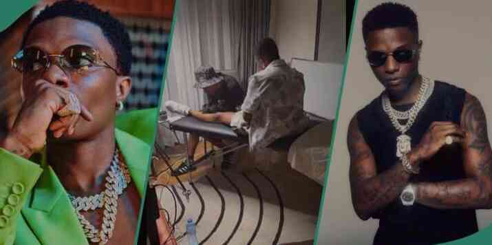 A new video of Wizkid having another tattoo on his leg has emerged on social media. - MirrorLog